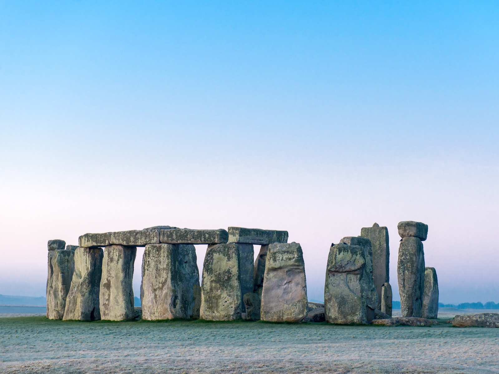 Stonehenge at dawn with frost on Salisbury Plain