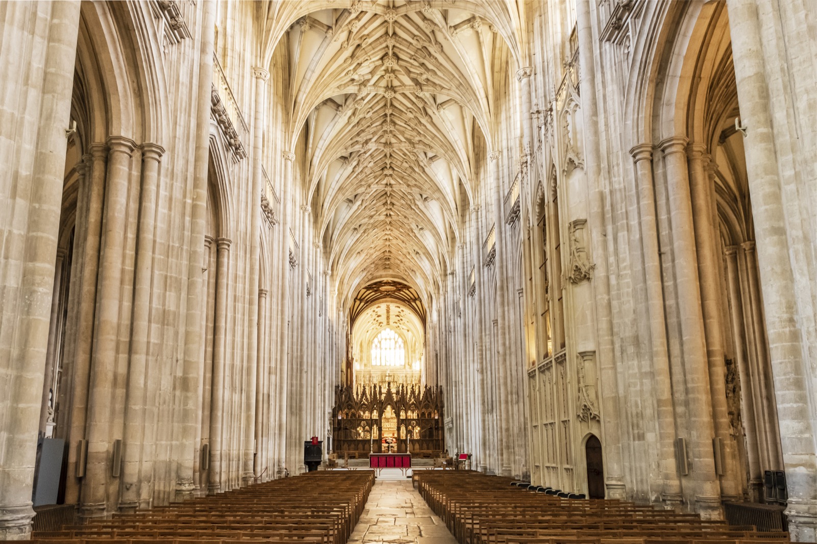 The nave of Winchester Cathedral with its Gothic vaulted ceiling